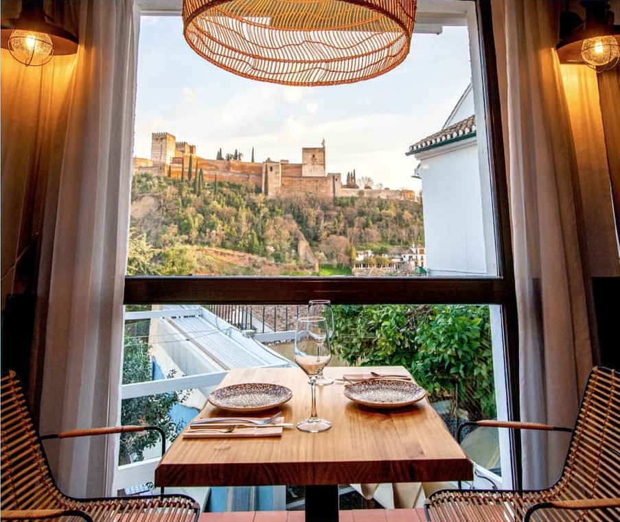 Restaurante Carmen El Agua Albaicín, wine house in Granada city center, outstanding kitchen, fusion cuisine. Romantic dinner fantastic views to Alhambra and Sierra Nevada